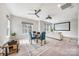 Bonus room featuring a screen, projector, stylish seating, and natural light at 3288 Sherman Dr, Lancaster, SC 29720