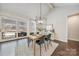 Cozy dining area with a modern chandelier and sliding glass doors to the outdoor space at 3288 Sherman Dr, Lancaster, SC 29720