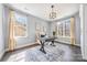 Bright home office with natural light, hardwood floors, and neutral color scheme at 3288 Sherman Dr, Lancaster, SC 29720