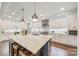 Spacious kitchen featuring granite countertops, stainless steel appliances, and a center island with seating at 3288 Sherman Dr, Lancaster, SC 29720