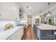 Bright kitchen with granite countertops, stainless steel appliances, and white cabinetry at 3288 Sherman Dr, Lancaster, SC 29720