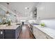 Bright, spacious kitchen featuring stainless steel appliances, granite countertops, and a large center island at 3288 Sherman Dr, Lancaster, SC 29720