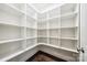 Walk-in pantry with custom shelving offers plenty of storage space at 3288 Sherman Dr, Lancaster, SC 29720