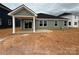 New home featuring a concrete patio and a covered porch at 338 Knotty Wood Dr # 69, Monroe, NC 28110