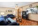 Charming living room with a cozy fireplace, plush sofas, and open layout, ideal for entertaining at 390 Rocky Rick Rd, Rockwell, NC 28138