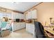 Bright room with ample counter and cabinet space, ideal for a home office or crafting area, featuring good lighting at 390 Rocky Rick Rd, Rockwell, NC 28138