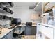 A tidy office space shows a sleek desk, built-in storage, and organized workspace for optimal productivity at 390 Rocky Rick Rd, Rockwell, NC 28138