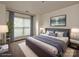 Inviting bedroom with stylish furnishings and a large window with curtains at 521 N Graham St # 2B, Charlotte, NC 28202