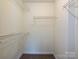Walk-in closet with shelving for optimal storage at 521 N Graham St # 2B, Charlotte, NC 28202