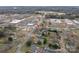 Scenic aerial view showcasing the property, inground pool, and surrounding neighborhood at 816 S Point Rd, Belmont, NC 28012
