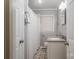 Cozy bathroom with shower and tub, granite-look vanity, and neutral gray walls, ready for relaxation at 816 S Point Rd, Belmont, NC 28012