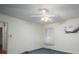 Cozy carpeted bedroom with a window, light fixture, and a fresh canvas for your personal touch at 816 S Point Rd, Belmont, NC 28012