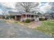 Charming single-story brick home with carport, front porch, and landscaped walkway at 816 S Point Rd, Belmont, NC 28012