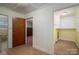Hallway view to bonus room and bedroom with pink carpeting at 816 S Point Rd, Belmont, NC 28012