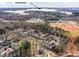 A beautiful neighborhood from above with the stunning Lake Norman in the background at 8925 Rosalyn Glen Rd, Cornelius, NC 28031