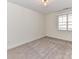 Bedroom with neutral carpet, light walls and a large window with blinds at 8925 Rosalyn Glen Rd, Cornelius, NC 28031
