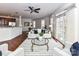 Spacious open concept living space with adjacent dining and kitchen areas at 8925 Rosalyn Glen Rd, Cornelius, NC 28031