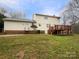 Expansive backyard with a deck and a well-maintained lawn, ideal for outdoor activities and entertaining at 9105 Capsdale Ct, Huntersville, NC 28078