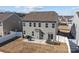 Exterior of home with spacious backyard, patio and privacy fence at 111 Old Field Rd, Statesville, NC 28677