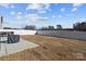 Spacious backyard with privacy fence and concrete patio at 111 Old Field Rd, Statesville, NC 28677