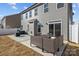 Backyard patio with outdoor seating on a sunny day at 111 Old Field Rd, Statesville, NC 28677