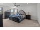 A beautifully decorated main bedroom with a plush bed and matching furniture set at 111 Old Field Rd, Statesville, NC 28677