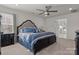 A bedroom with a luxurious king-size bed and an ensuite bathroom at 111 Old Field Rd, Statesville, NC 28677