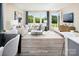 Airy living room with modern furnishings, large windows, and access to an outdoor patio, ideal for relaxation at 12233 Gambrell Dr, Charlotte, NC 28278
