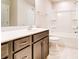 Bathroom featuring a vanity with double sinks, and combination tub and shower at 12237 Gambrell Dr, Charlotte, NC 28278
