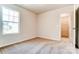 Bedroom with carpet, natural light, and a walk-in closet with shelving for storage at 12237 Gambrell Dr, Charlotte, NC 28278