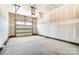 Spacious two-car garage with high ceilings and a smooth concrete floor. Perfect for storage at 12237 Gambrell Dr, Charlotte, NC 28278