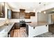 Modern kitchen with island, stainless steel appliances, granite counters, and white backsplash at 12237 Gambrell Dr, Charlotte, NC 28278