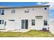 Backyard features a sliding door and a patio perfect for outdoor relaxation at 12241 Gambrell Dr, Charlotte, NC 28278