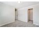 Neutral bedroom boasts plush carpeting, closet, and is freshly painted at 12241 Gambrell Dr, Charlotte, NC 28278