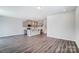 Spacious living room and open kitchen design offers versatile living with a large space to use at 12241 Gambrell Dr, Charlotte, NC 28278