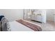 Neutral bedroom shows a view of the hallway with a light colored dresser at 1402 Richmond Dr # 1, Lowell, NC 28098
