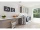 Laundry room with gray cabinets, folding counter, utility sink, and front load washer and dryer at 1402 Richmond Dr # 1, Lowell, NC 28098