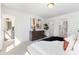 Bright main bedroom with ensuite bathroom and walk-in closet entrances at 1402 Richmond Dr # 1, Lowell, NC 28098