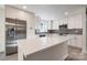 A beautifully updated kitchen features new stainless steel appliances and a large island at 1522 Wickham Ln, Charlotte, NC 28208