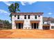 New home under construction with multiple sliding glass doors and rear-facing windows at 2526 Elkwood Cir, Charlotte, NC 28205