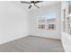 Bedroom featuring natural light, neutral carpet, and a ceiling fan at 3812 Odom Way, Charlotte, NC 28216