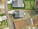 Aerial view of the home showing the roof, backyard, driveway, and neighboring homes at 5239 Admirals Lndg, Lancaster, SC 29720