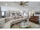 Bright, open-concept living room showcasing a modern kitchen, comfortable seating, and stylish decor at 5239 Admirals Lndg, Lancaster, SC 29720