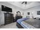 Well-appointed main bedroom featuring a dark wood dresser and access to the ensuite bathroom at 5239 Admirals Lndg, Lancaster, SC 29720