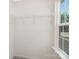 Walk-in closet with wire shelving and a window offering natural light at 8465 Old Plank Rd, Charlotte, NC 28216