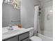 A well lit bathroom features a sink, toilet, shower and decor at 9900 Silverling Dr, Waxhaw, NC 28173