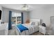 A cozy bedroom offers a comfortable bed, and a scenic view from the window at 9900 Silverling Dr, Waxhaw, NC 28173