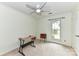 This bedroom features carpet, a ceiling fan, a window and neutral walls at 10213 Conistan Pl, Cornelius, NC 28031