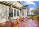 Wooden deck featuring outdoor furniture with views of the house at 1114 Oak Alley Dr, Indian Trail, NC 28079