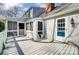 Exterior back porch with multiple doors and access to the yard at 1207 Chadbourne Ave, Concord, NC 28027